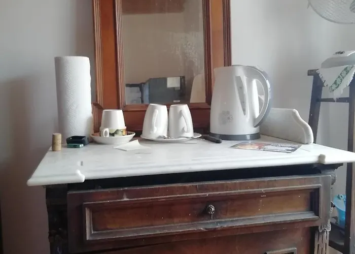 - Centar Vendégház Cres